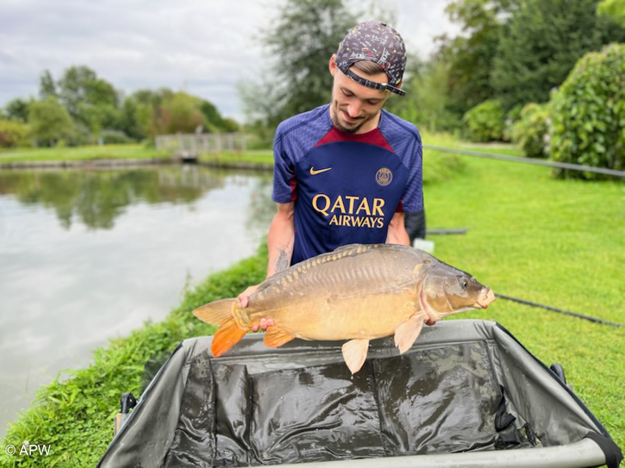 Carpe de 12kg prise par Julien et poids validé par Carlos.